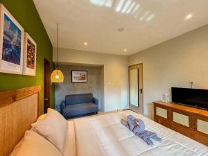 Postel nebo postele na pokoji v ubytování Locus Coliving