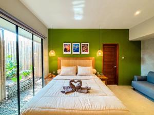 Postel nebo postele na pokoji v ubytování Locus Coliving
