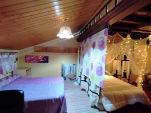 Cama o camas de una habitación en Viviendas Uso Turisitico, Al BUHAR