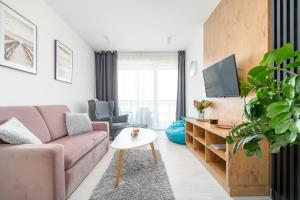 Telewizja i/lub zestaw kina domowego w obiekcie Westin House Resort Kołobrzeg Apartament 410