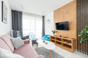 Telewizja i/lub zestaw kina domowego w obiekcie Westin House Resort Kołobrzeg Apartament 410