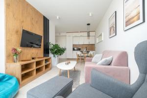 Telewizja i/lub zestaw kina domowego w obiekcie Westin House Resort Kołobrzeg Apartament 410