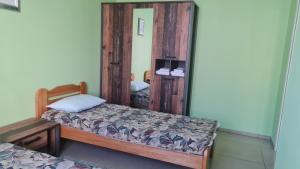 Postel nebo postele na pokoji v ubytování Hotel Tukums