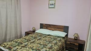 Postel nebo postele na pokoji v ubytování Hotel Tukums