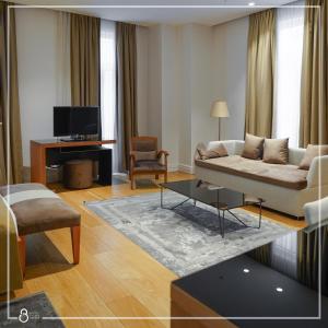 A television and/or entertainment centre at Misafir Suites 8 Istanbul