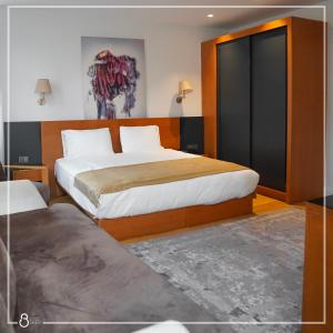 A bed or beds in a room at Misafir Suites 8 Istanbul