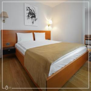 A bed or beds in a room at Misafir Suites 8 Istanbul