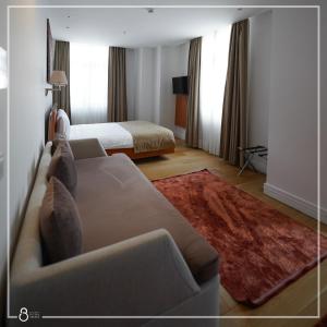 A bed or beds in a room at Misafir Suites 8 Istanbul