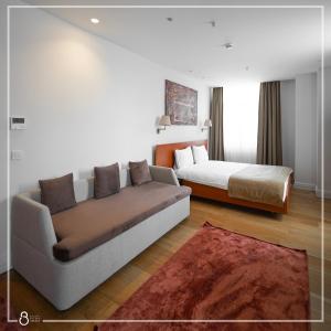 A bed or beds in a room at Misafir Suites 8 Istanbul