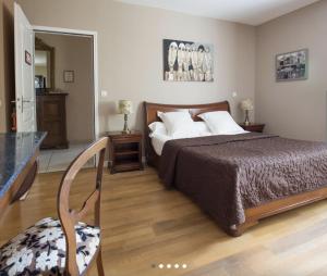 Postel nebo postele na pokoji v ubytování LE CLOS D'IGNAC