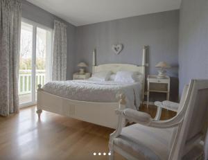 Postel nebo postele na pokoji v ubytování LE CLOS D'IGNAC