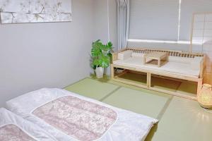 Postel nebo postele na pokoji v ubytování 55平方!2卧室可住7人,5分黒門市場,難波,道頓堀,心斎橋,大阪城,天王寺,Wi-Fi,新規