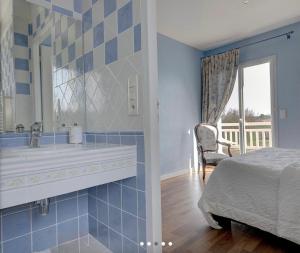 Postel nebo postele na pokoji v ubytování LE CLOS D'IGNAC