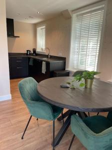 Kuchyň nebo kuchyňský kout v ubytování De Witte Reiger