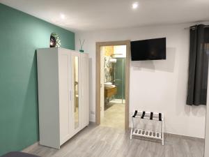 TV a/nebo společenská místnost v ubytování Studio Apartments Salvo 7