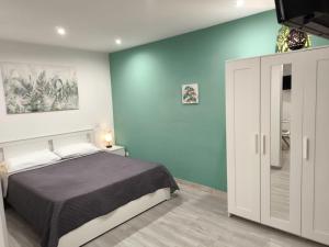 Postel nebo postele na pokoji v ubytování Studio Apartments Salvo 7