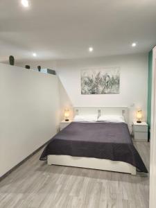 Postel nebo postele na pokoji v ubytování Studio Apartments Salvo 7