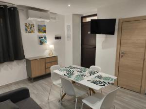 TV a/nebo společenská místnost v ubytování Studio Apartments Salvo 7