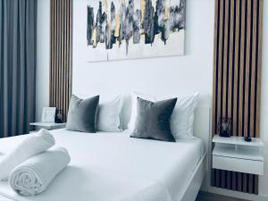 Postel nebo postele na pokoji v ubytování Bella Residence