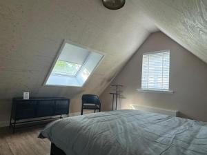 Postel nebo postele na pokoji v ubytování De Witte Reiger