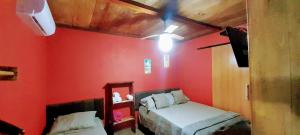 Cama ou camas em um quarto em Chalés Guigó-Cumuruxatiba, sossego e privacidade