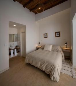 Postel nebo postele na pokoji v ubytování Martino Wines Air B&B