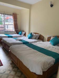 Katil atau katil-katil dalam bilik di The Tranqulity Inn