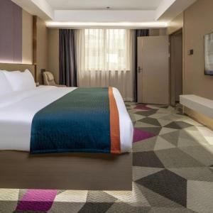 Shenzhen Jincheng Hotel客房内的一张或多张床位