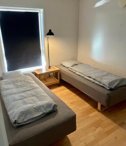 Postel nebo postele na pokoji v ubytování Isi4u Sleep 'n Go