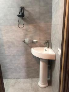 Koupelna v ubytování Verona Apartment