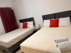 Postel nebo postele na pokoji v ubytování Apartamentos Trebol