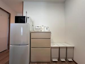 Kin-Con-Kan 301 新築 那覇空港から車で25分 コンビニ徒歩1分 沖縄ワールド徒歩9分ファミリーや長期滞在者にもお勧め的厨房或小厨房
