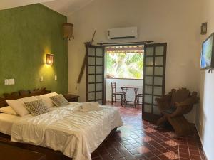 Foto da galeria de Pousada Passeio Brig Maresias em Maresias