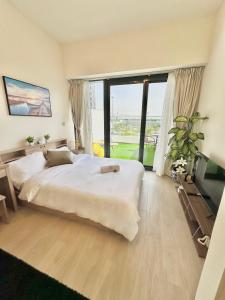 Katil atau katil-katil dalam bilik di Cozy Retreat, Relax and Explore