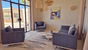 Posezení v ubytování Lalla Essaouira, Villa Najma avec piscine pour 15 personnes