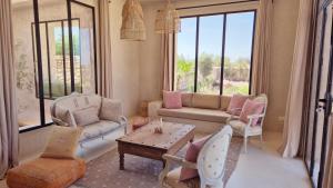 Posezení v ubytování Lalla Essaouira, Villa Najma avec piscine pour 15 personnes
