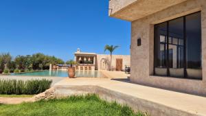 Bazén v ubytování Lalla Essaouira, Villa Najma avec piscine pour 15 personnes nebo v jeho okolí