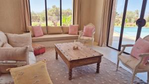 Posezení v ubytování Lalla Essaouira, Villa Najma avec piscine pour 15 personnes