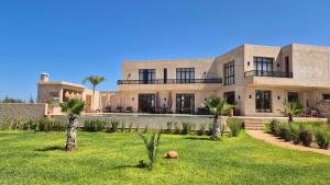 Zahrada ubytování Lalla Essaouira, Villa Najma avec piscine pour 15 personnes