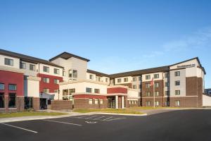 a rendering of a hotel with a parking lot at Residence Inn by Marriott Minneapolis St. Paul/Eagan in Eagan