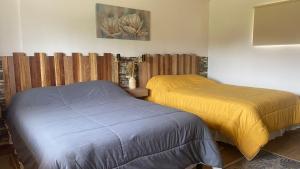 Postel nebo postele na pokoji v ubytování Hacienda la moya, Cotopaxi