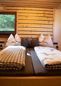 Postel nebo postele na pokoji v ubytování Chalet Gletscherblick Stubai
