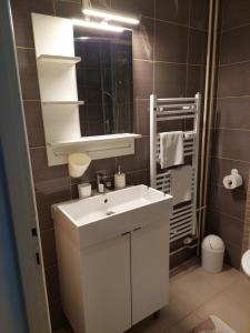 Koupelna v ubytování Apartman Aleja