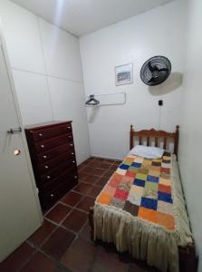 Postel nebo postele na pokoji v ubytování Hostel e Hotel Reale