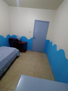 Postel nebo postele na pokoji v ubytování Hostel e Hotel Reale