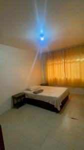 Postel nebo postele na pokoji v ubytování Hostel e Hotel Reale