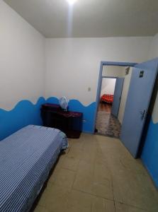 Postel nebo postele na pokoji v ubytování Hostel e Hotel Reale