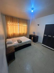 Postel nebo postele na pokoji v ubytování Hostel e Hotel Reale