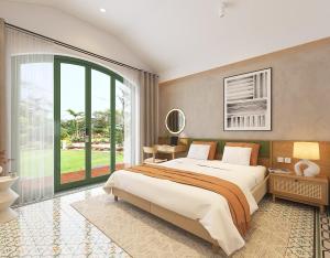 a bedroom with a large bed and a large window at Plum Village Moc Chau in Mộc Châu