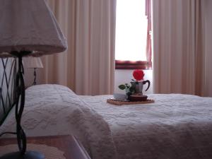 Voodi või voodid majutusasutuse B&B Castiglias toas